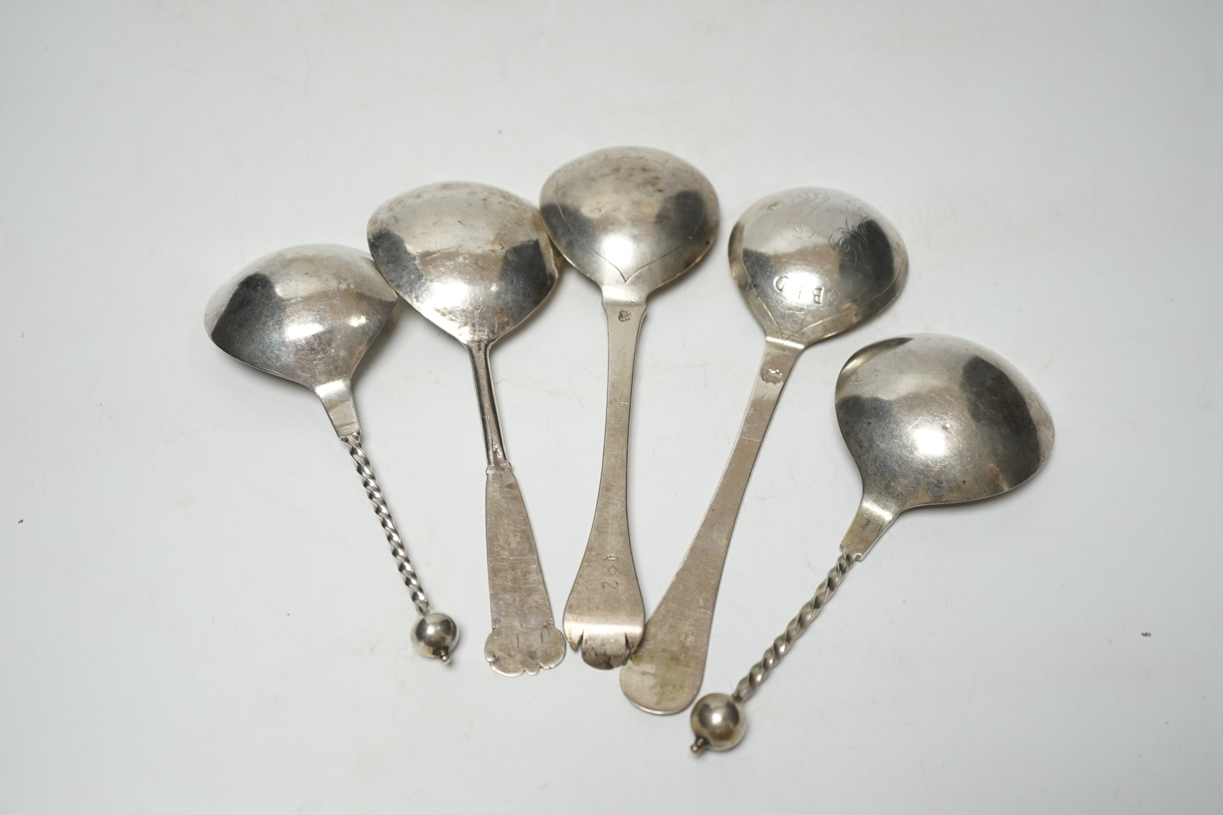 Five assorted 19th century and later Scandinavian? white metal spoons, two with maker's marks, largest 18cm.